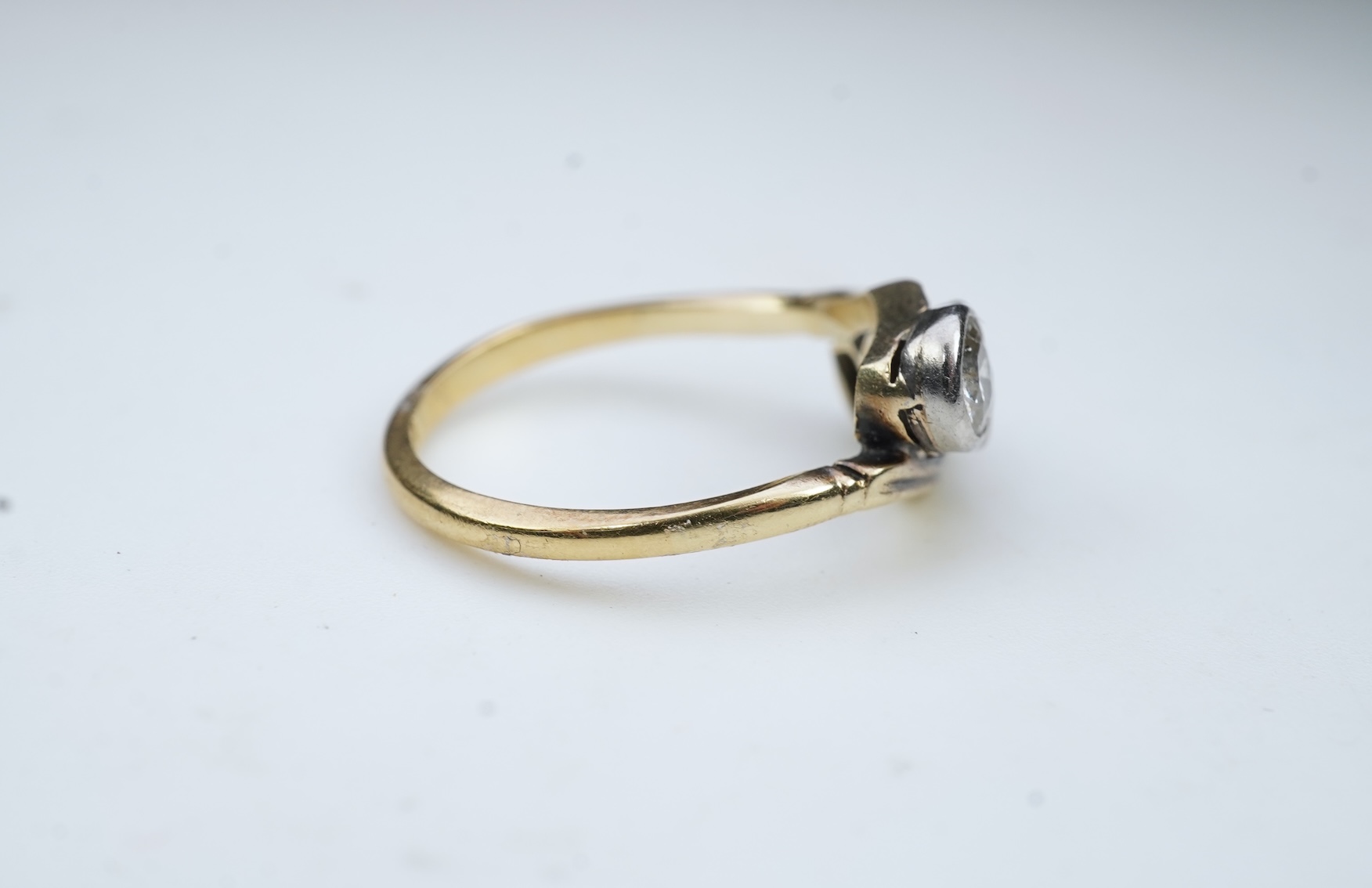 A three-stone diamond ring, early 20th century